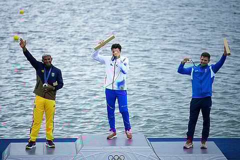 Paris Olympics men's canoe single 1000-meter: silver medalist Isaquias Guimaraes Queiroz, of Brazil, gold medalist Martin Fuksa, of the Czech Republic, and bronze medalist Serghei Tarnovschi, of Moldova